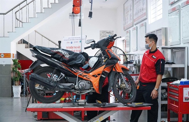 Hiện một số đại lý sửa chữa lớn có thể tham gia kiểm định khí thải xe máy. Ảnh: V.LONG