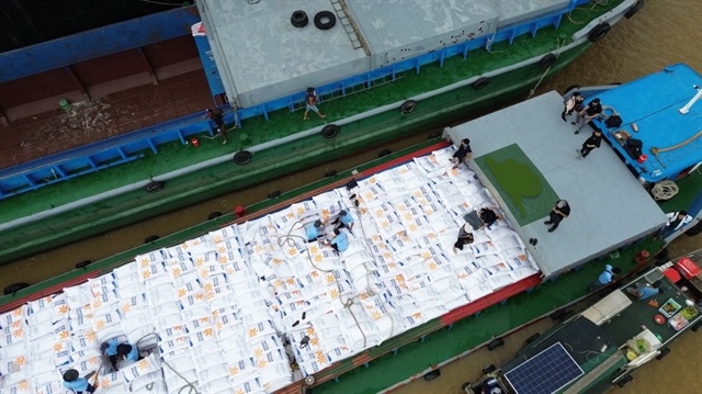 Theo dự thảo Nghị quyết của Chính phủ về việc tiếp tục cắt giảm các ngành, nghề đầu tư kinh doanh có điều kiện, Bộ Tài chính đề xuất bãi bỏ giấy phép kinh doanh xuất khẩu gạo. Ảnh: QH