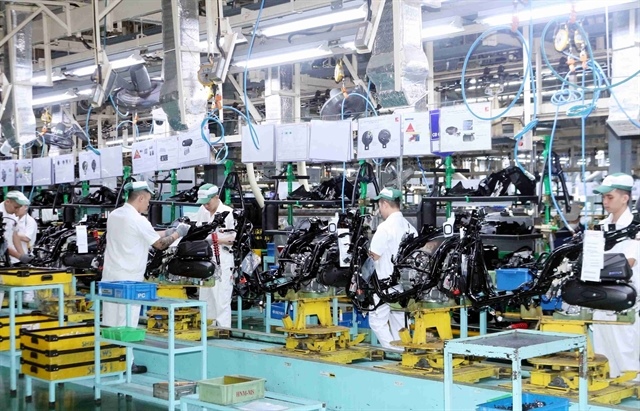 Manufacturing thrives in May despite cost pressures