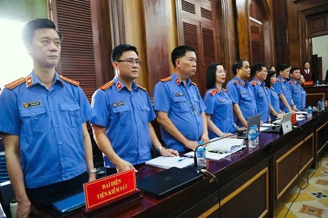 Đại diện Viện kiểm sát giữ quyền công tố tại một phiên tòa. Ảnh: HOÀNG GIANG