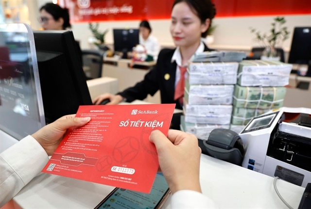 Lower interbank rates support stocks, but year-end risks persist