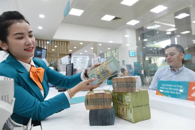Dòng tiền trở lại ngân hàng, áp lực lãi suất có bớt căng?