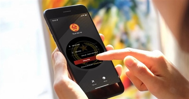 Nộp thuế qua eTax Mobile có thể gỡ tạm hoãn xuất cảnh sau 3-5 phút