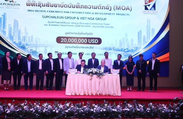 /2026/10/viet-nam-laos-firms-sign-deals-on-property-smart-farming-projects-52000-645978.htm